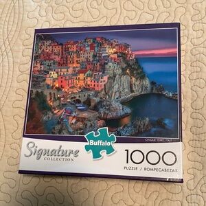 1000 piece jigsaw puzzle. Made by Buffalo.